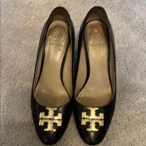 Tory Burch Black wedges, with gold logo.